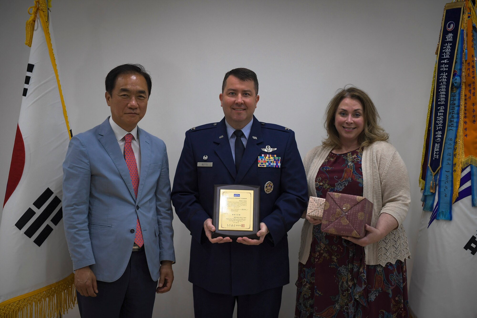 U.S. Air Force Col. William Betts, 51st Fighter Wing commander, accepts an honorary citizenship plaque from Pyeongtaek Mayor Jung Jang-seon in Pyeongtaek, Republic of Korea, May 29, 2019. Jang-seon awarded Betts for his and Osan Air Base’s continued support and contributions to the community. (U.S. Air Force photo by Staff Sgt. Greg Nash)