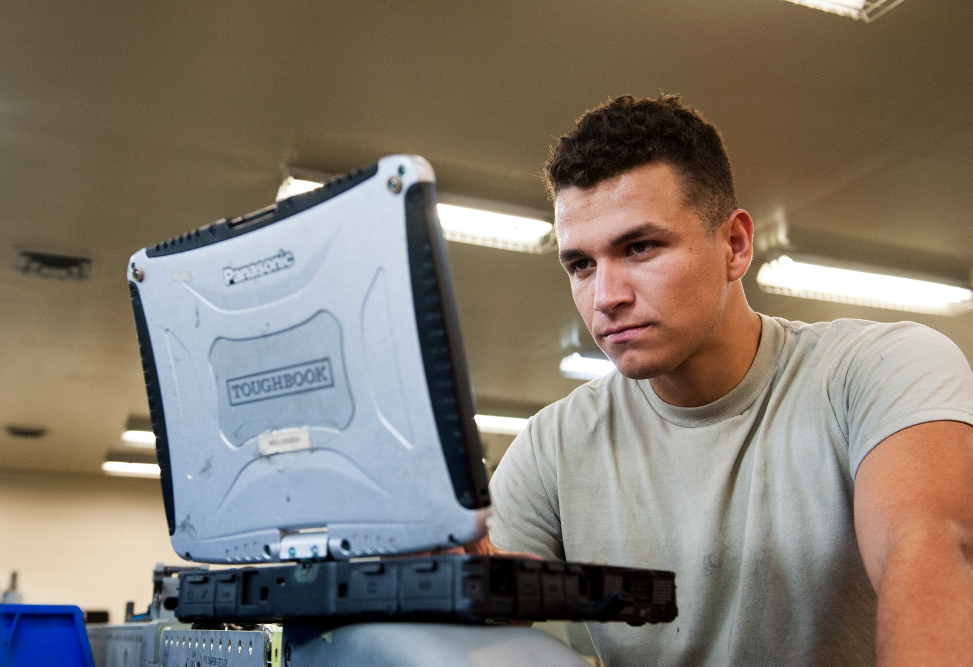 U. S. Air Force Airman 1st Class Geoffrey Negrete, armament maintenance member assigned to the 18th Equipment Maintenance Squadron, reviews a technical order at Kadena Air Base, Japan, May 29, 2019.