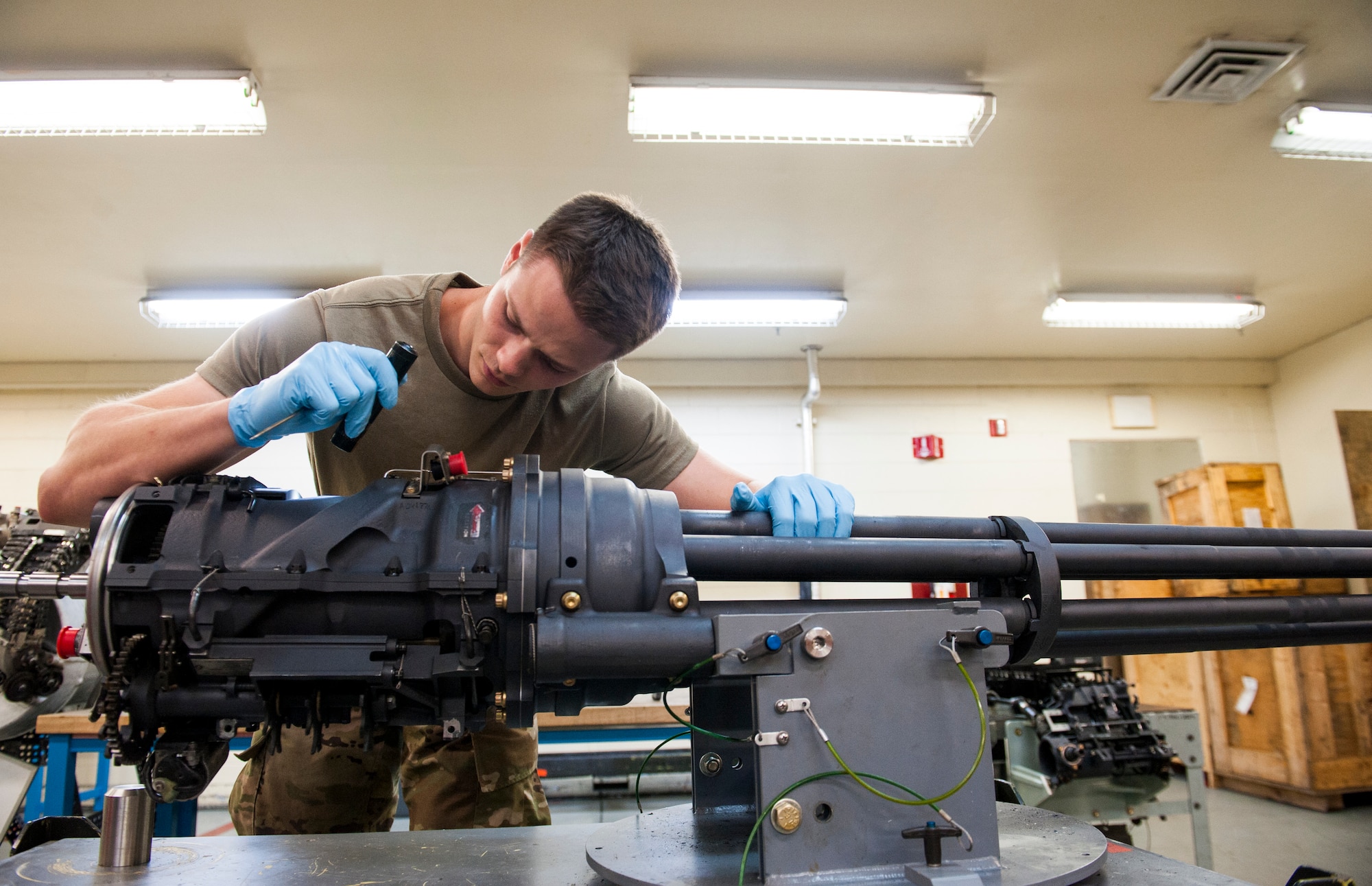 U. S. Air Force Staff Sgt. Joshua Boyd, armament maintenance supervisor assigned to the 18th Equipment Maintenance Squadron, inspects a 20mm Automatic M61A1 at Kadena Air Base, Japan, May 29, 2019.