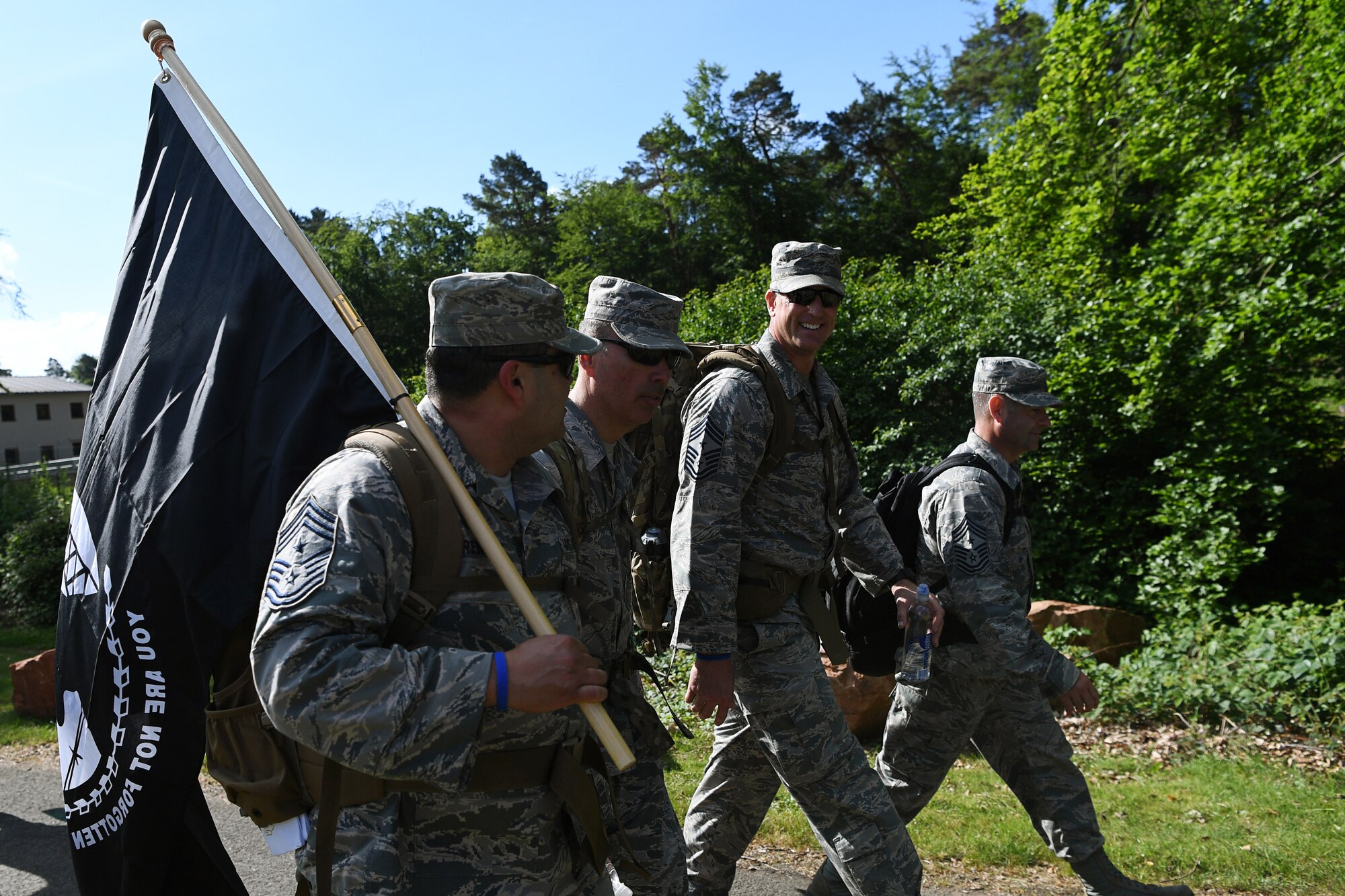 Ramstein Air Base leadership walk during the Fourth Annual Chief Master Sgt. of the Air Force Paul Airey Memorial Ruck on Ramstein Air Base, Germany, May 31, 2019.