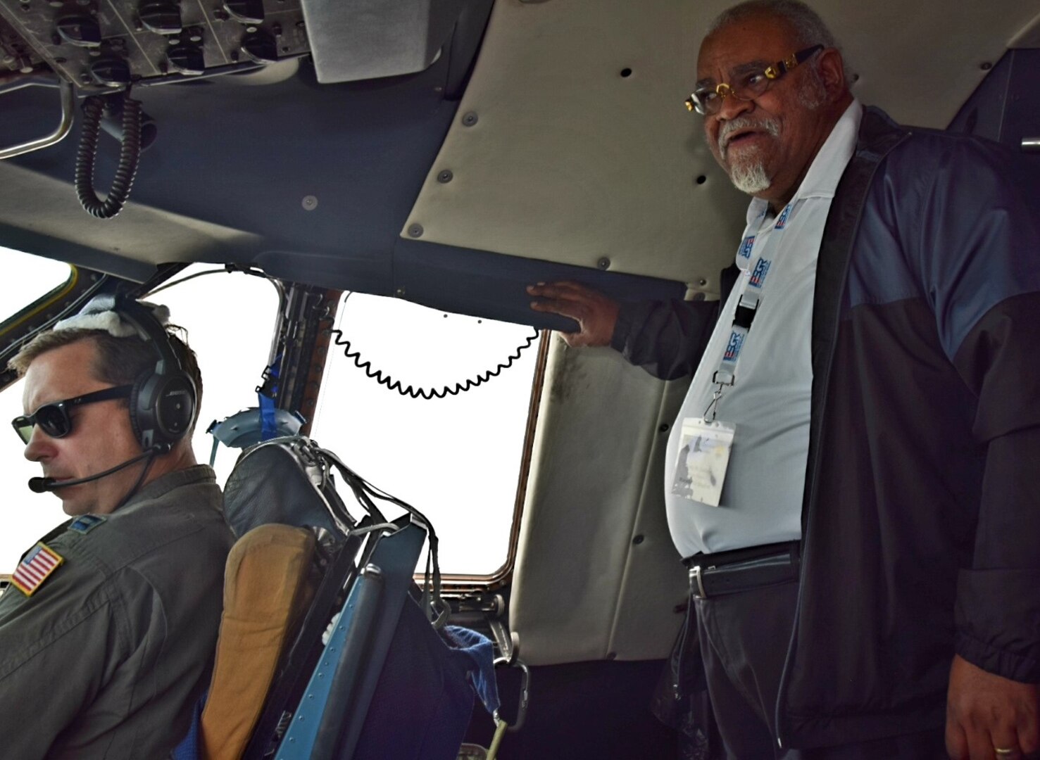 Jerry W. Dailey (right), Macedonia Baptist senior pastor, observes pilots flying the C-5M Super Galaxy during the 433rd Airlift Wing’s annual Clergy Day flight June 1 at Joint Base San Antonio-Lackland. The 20 ministers began the day with briefings and ended the event meeting their nominating Reserve Citizen Airman for lunch.