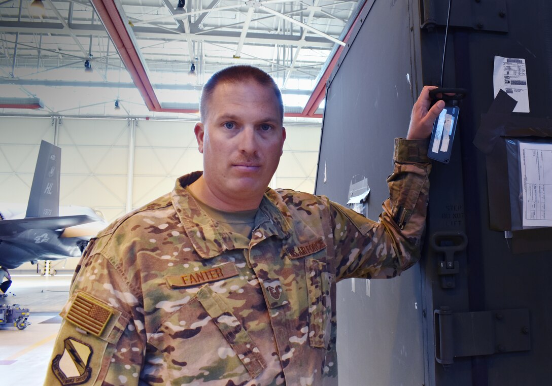 Tech. Sgt. Allen Fanter, the non-commissioned officer in charge of cargo operations for the 388th Maintenance Group, stands next to a cargo container in a hangar at Aviano Air Base, Italy during Astral Knight 2019. Fanter is the man tasked with making sure everything needed for a deployment gets to where it needs to be. This is one of more than a dozen movements Fanter has overseen since the 388th and 419th Fighter Wing's received their first F-35As in 2015. (U.S. Air Force photo by Micah Garbarino)