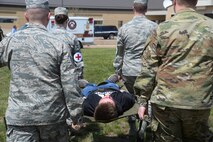 Various injuries during the scenario required Airmen to apply hemorrhage control, splinting, simple first aid, evaluation and assessment, and patient transport.
