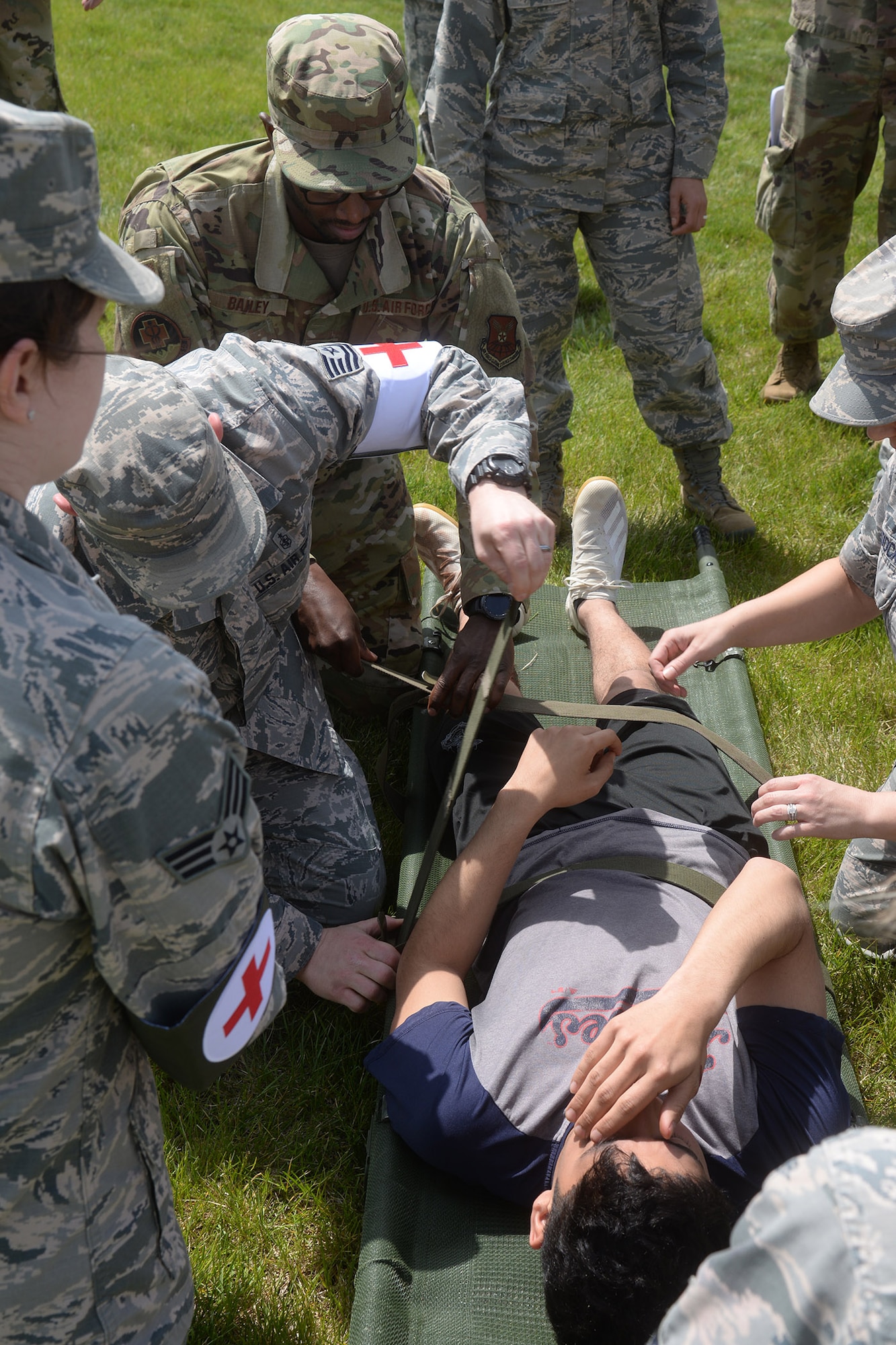 All Airmen within the medical group came together to care for victims during a Comprehensive Operational Low Level Training mass casualty exercise.