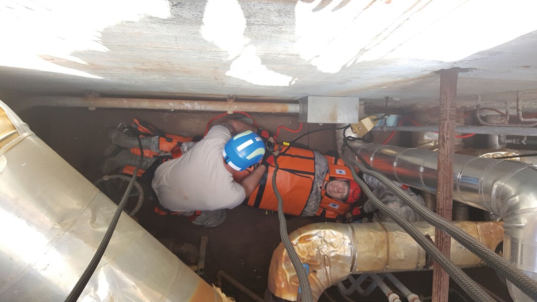 Reserve Citizen Airmen from the 445th Civil Engineer Squadron participate in confined space rescue training during the May 5, 2019, unit training assembly at Wright Patterson Air Force Base, Ohio. The training is designed to prepare CES firefighters to retrieve injured personnel who have become stuck in maintenance tunnels, access ways and similarly confined spaces.