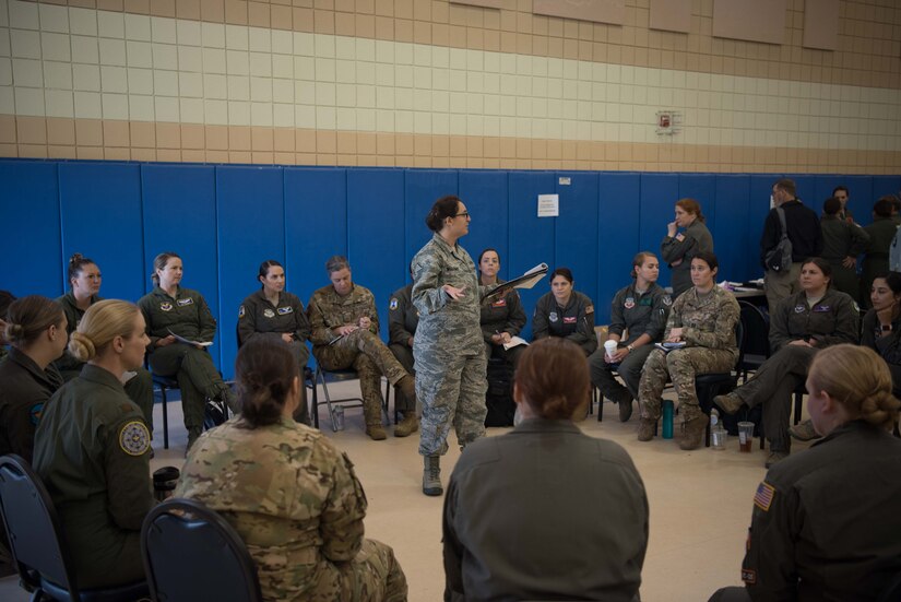 A group of U.S. Air Force and U.S. Navy female aviators have a discussion about some of the improvements they want to see made to their flight equipment during a Female Fitment Event at Joint Base Langley-Eustis, Virginia, June 4, 2019. The event took measurements from female aviators from the U.S. Air Force and the U.S. Navy at various stages in their careers, to get an accurate depiction of the changes needed to flight equipment. (U.S. Air Force photo by Airman 1st Class Marcus M. Bullock)