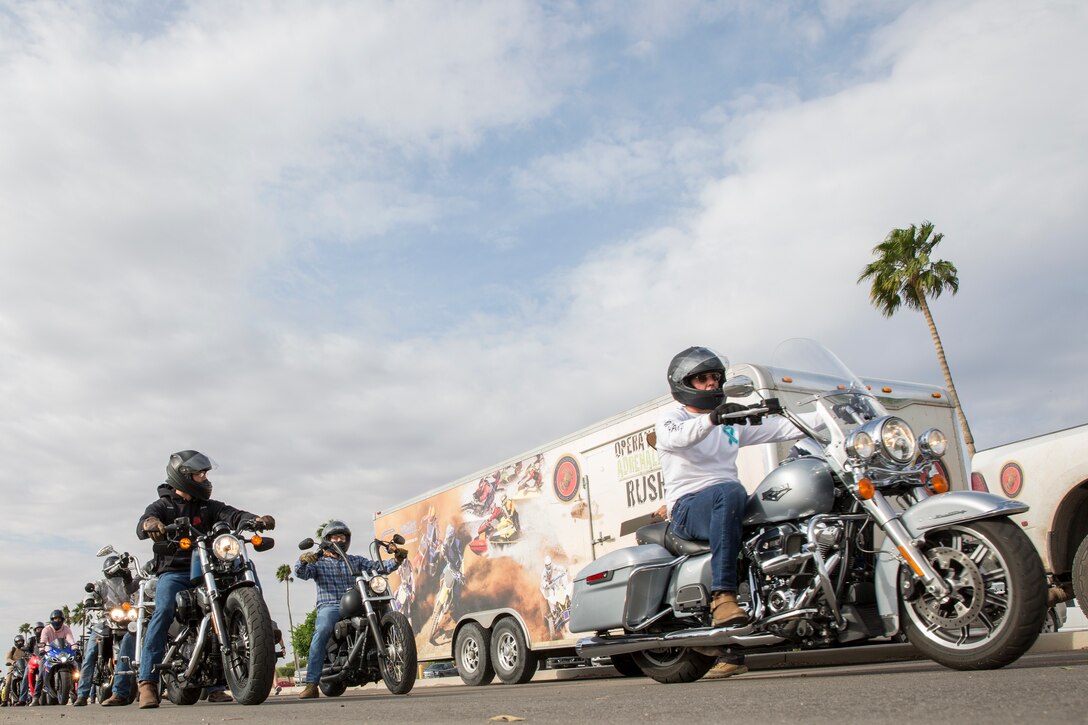 U.S. Marines, Sailors, and civilians participate in the 6th annual Sexual Assualt Prevention and Response (SAPR) motorcycle ride on Marine Corps Air Station (MCAS) Yuma, April 12, 2019. The SAPR motorcycle ride is held annually through the Marine Corps Community Service (MCCS) program in efforts to raise awareness. (U.S. Marine Corps photo by Sgt. Allison Lotz)