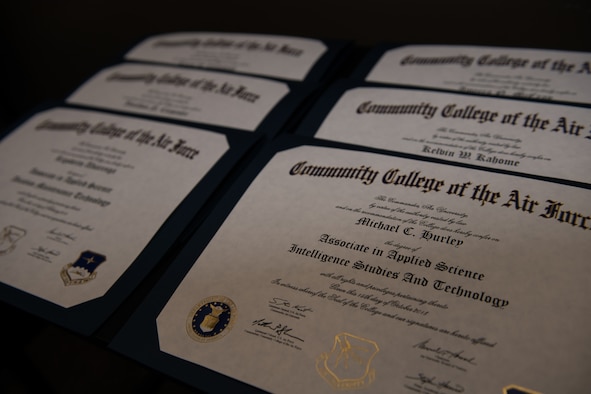 Airmen with the 932nd Airlift Wing graduate from the Community College of the Air Force,  June 2, 2019, Scott Air Force Base, Illinois. CCAF started in the early 1970s as a way to gain accreditation and recognition for training by the Air Force. (U.S. Air Force photo by Master Sgt. Christopher Parr)