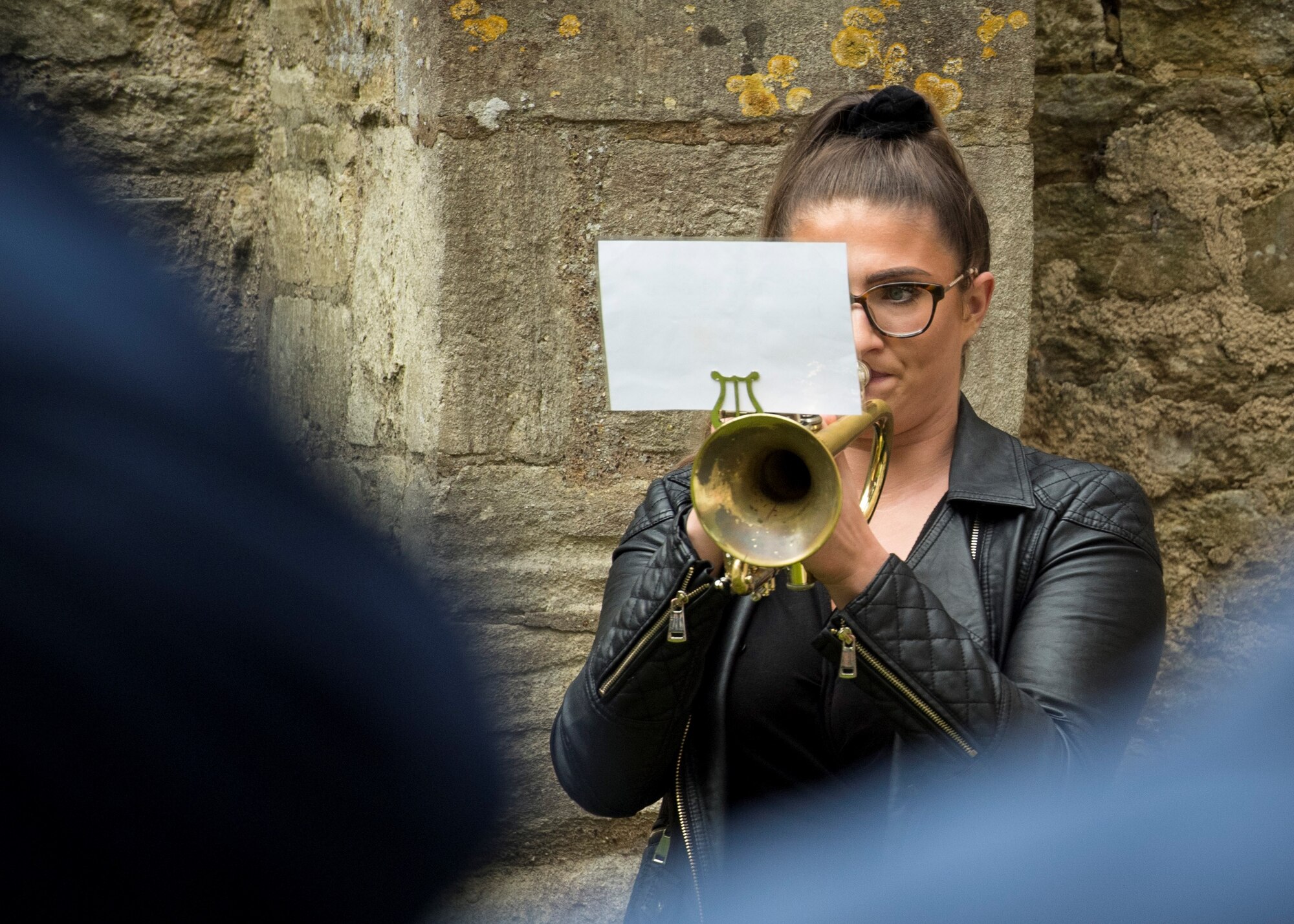 A reverend with the St. John the Baptist Chelveston Church in Chelveston, England, provides a religious service to include Airmen from the 305th Air Mobility Wing, Joint Base McGuire-Dix-Lakehurst, New Jersey, May 26, 2019. The service, which payed respects to the 305th Bomb Group which has evolved into the 305th AMW, was a group of over 4,000 military members that fought in World War II to defend and attack against axis powers. (U.S. Air Force photo by Senior Airman Jake Carter)