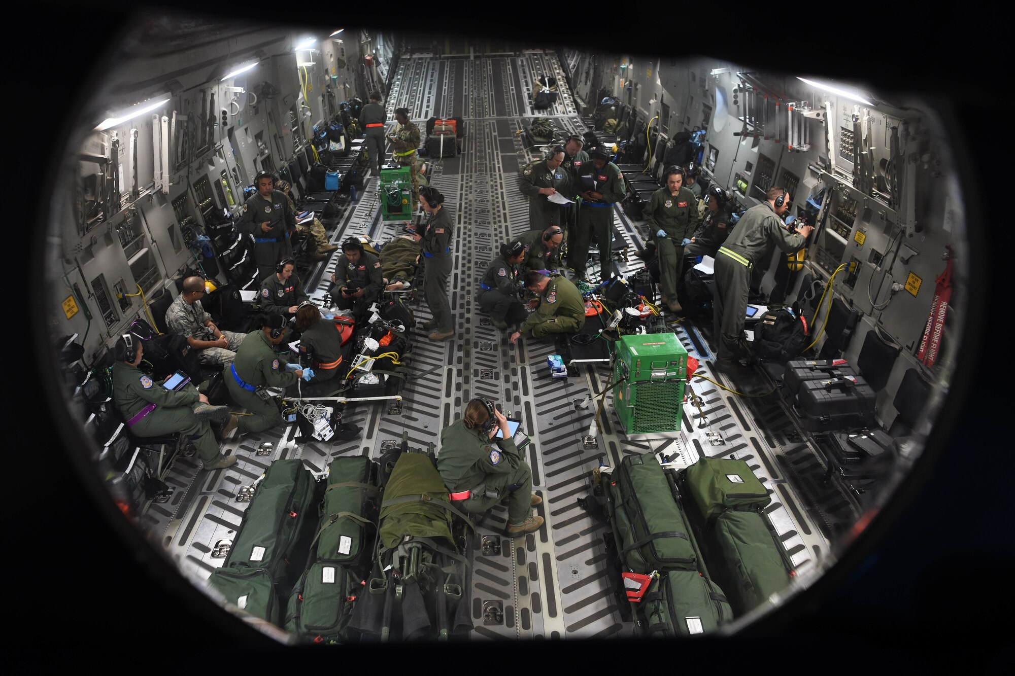 Airmen awaiting evaluation results in aircraft