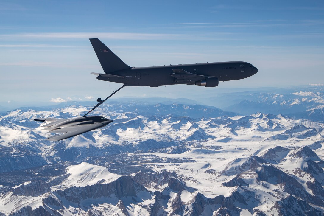 EDWARDS AIR FORCE BASE, Calif. --KC-46 refuels the B-2 for the first time during developmental flight test over Edwards AFB and the Sierra Nevada Mountains on Apr. 23, 2019. (U.S. Air Force photo by Christian Turner)