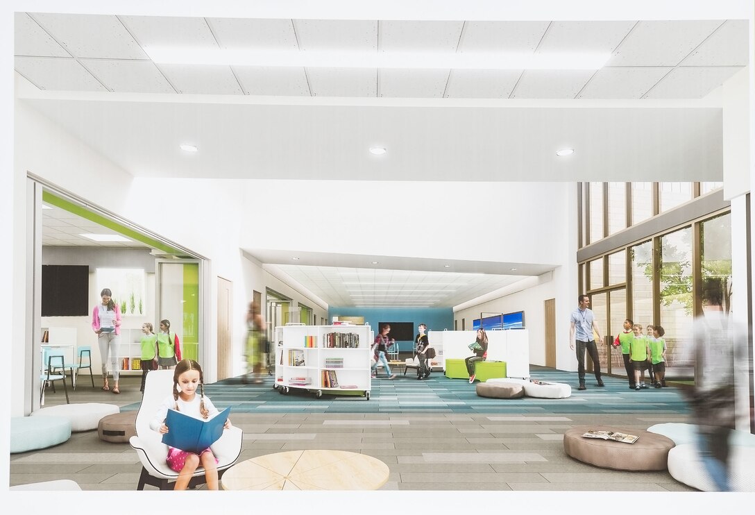 A  rendering of the new Welch Elementary School/Dover Air Base Middle School is displayed on the podium during a groundbreaking ceremony June 3, 2019, in the family housing area at Dover Air Force Base, Del. The $48 million project, federally funded by the Department of Defense Education Activity, will be built on the football field across the street from the Youth Center and adjacent to the existing elementary and middle schools. Scheduled to open at the beginning of the 2021 school year, the new building will have over 105,000 square feet of learning space for approximately 490 students. (U.S. Air Force photo by Roland Balik)
