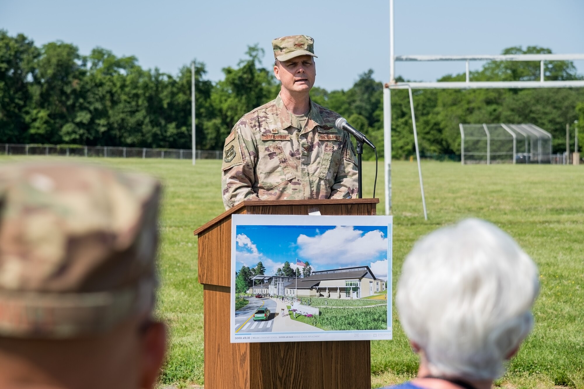 Col. Joel Safranek, 436th Airlift Wing commander, speaks to attendees at the groundbreaking ceremony for the new Welch Elementary School/Dover Air Base Middle School June 3, 2019, in the family housing area at Dover Air Force Base, Del. The $48 million project federally funded by the Department of Defense Education Activity will be built at the football field across the street form the Youth Center and adjacent to the existing elementary and middle schools. Scheduled to open at the beginning of the 2021 school year, the new building will have more than 105,000 square feet in learning space for approximately 490 students. (U.S. Air Force photo by Roland Balik)