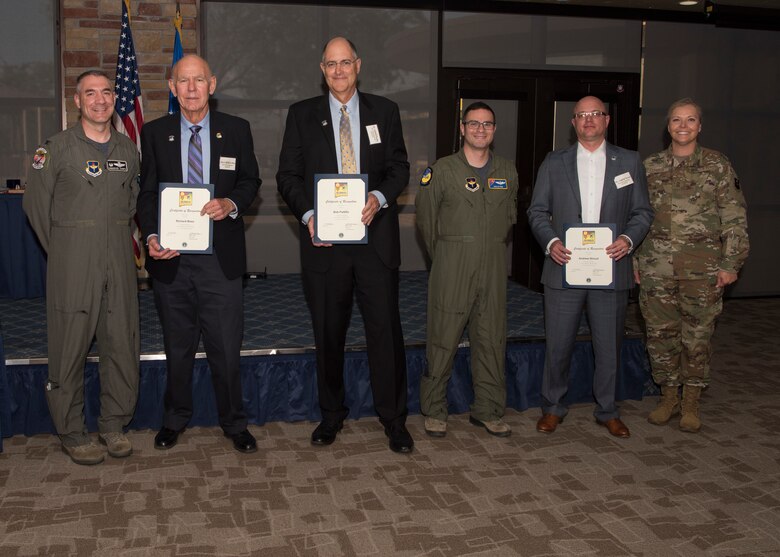 Col. Joseph Campo, 49th Wing commander (left) and Chief Master Sgt. Sarah Esparza, 49th Wing command chief (right), pose with the 49th Wing Staff Agencies honorary commanders and Maj. Thomas Wittwer, Command Post director (fourth from the left), pose for a photo, May 31, 2019, on Holloman Air Force Base, N.M. The honorary commander program establishes and maintains personal relationships with local civic leaders, and aids in increasing public awareness of the missions, policies and programs of the Department of Defense and United States Air Force. (U.S. Air Force photo by Staff Sgt. BreeAnn Sachs)