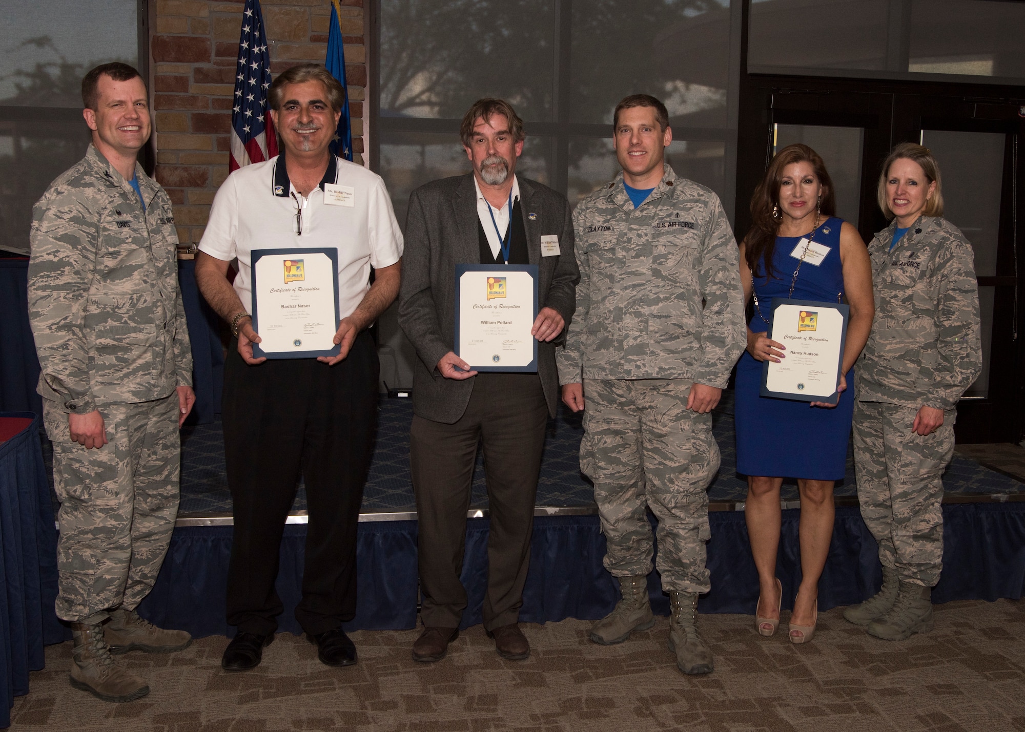 Commanders and honorary commanders from the 49th Medical Group pose for a photo, May 31, 2019, on Holloman Air Force Base, N.M. The honorary commander program establishes and maintains personal relationships with local civic leaders, and aids in increasing public awareness of the missions, policies and programs of the Department of Defense and United States Air Force. (U.S. Air Force photo by Staff Sgt. BreeAnn Sachs)