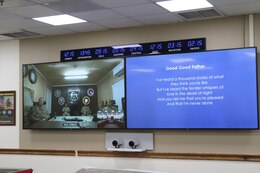 The Unit Ministry Team, 184th Sustainment Command, brings religious services to warfighters near and far using Video Teleconference technology during a recent church service at Camp Arifjan, Kuwait, May 26, 2019.