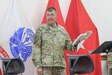 Lt. Col. Terry Partin, command chaplain for the 184th Sustainment Command, offers religious services to warfighters near and far using video teleconference technology during a service at Camp Arifjan, Kuwait, May 26, 2019.