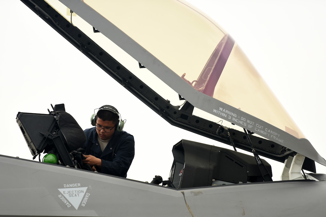Senior Airman Shawn Pham, 421st Aircraft Maintenance Unit crew chief, inspects an F-35A Lightning II fighter jet during Astral Knight 2019 on June 5, 2019, at Aviano Air Base, Italy. The F-35A is the U.S. Air Force’s latest fifth-generation fighter that complements the air superiority of other fourth and fifth-generation aircrafts. (U.S. Air Force photo by Tech. Sgt. Jim Araos)