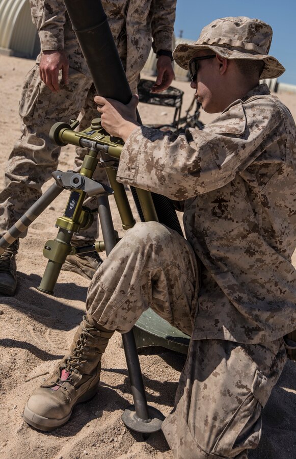 U.S. Marine Lance Cpl. Robert Morgan, a mortarman with Weapons Company, 3rd Battalion, 25th Marine Regiment, 4th Marine Division adjusts an 81mm mortar system during Integrated Training Exercise 4-19 at Marine Corps Air Ground Combat Center Twentynine Palms, Calif., June 5, 2019. ITX measures the ability to provide a cohesive, trained and ready capability in support of service and Combatant Commander requirements. (U.S. Marine Corps photo by Cpl. Tessa D. Watts)