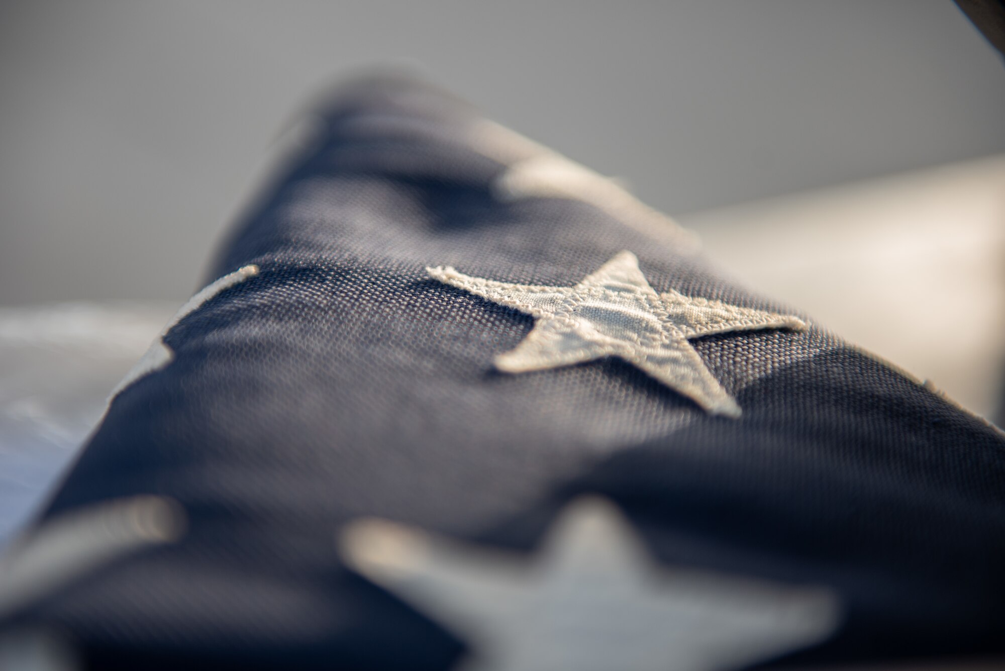 A 48-star U.S. flag rests on a toolbox June 6, 2019, at Al Dhafra Air Base, United Arab Emirates.