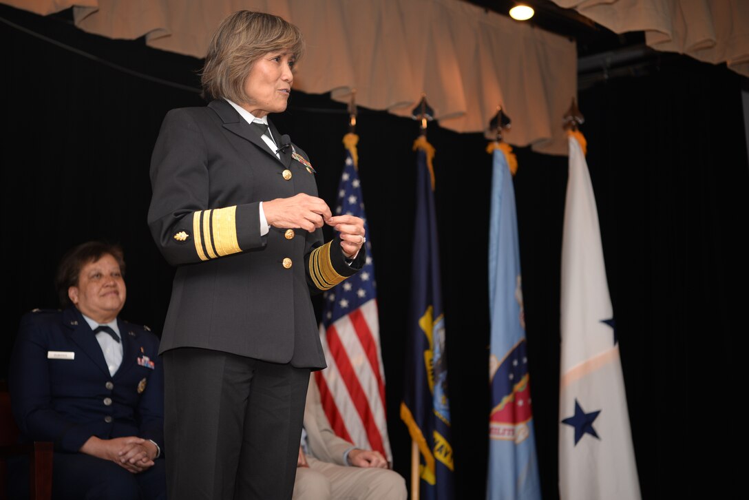 U.S Navy Vice Adm. Raquel C. Bono, Defense Health Agency Medical Corps director, addresses Graduate Medical Education program residents at their graduation ceremony inside the Don Wylie Auditorium at Keesler Air Force Base, Mississippi, May 23, 2019.
