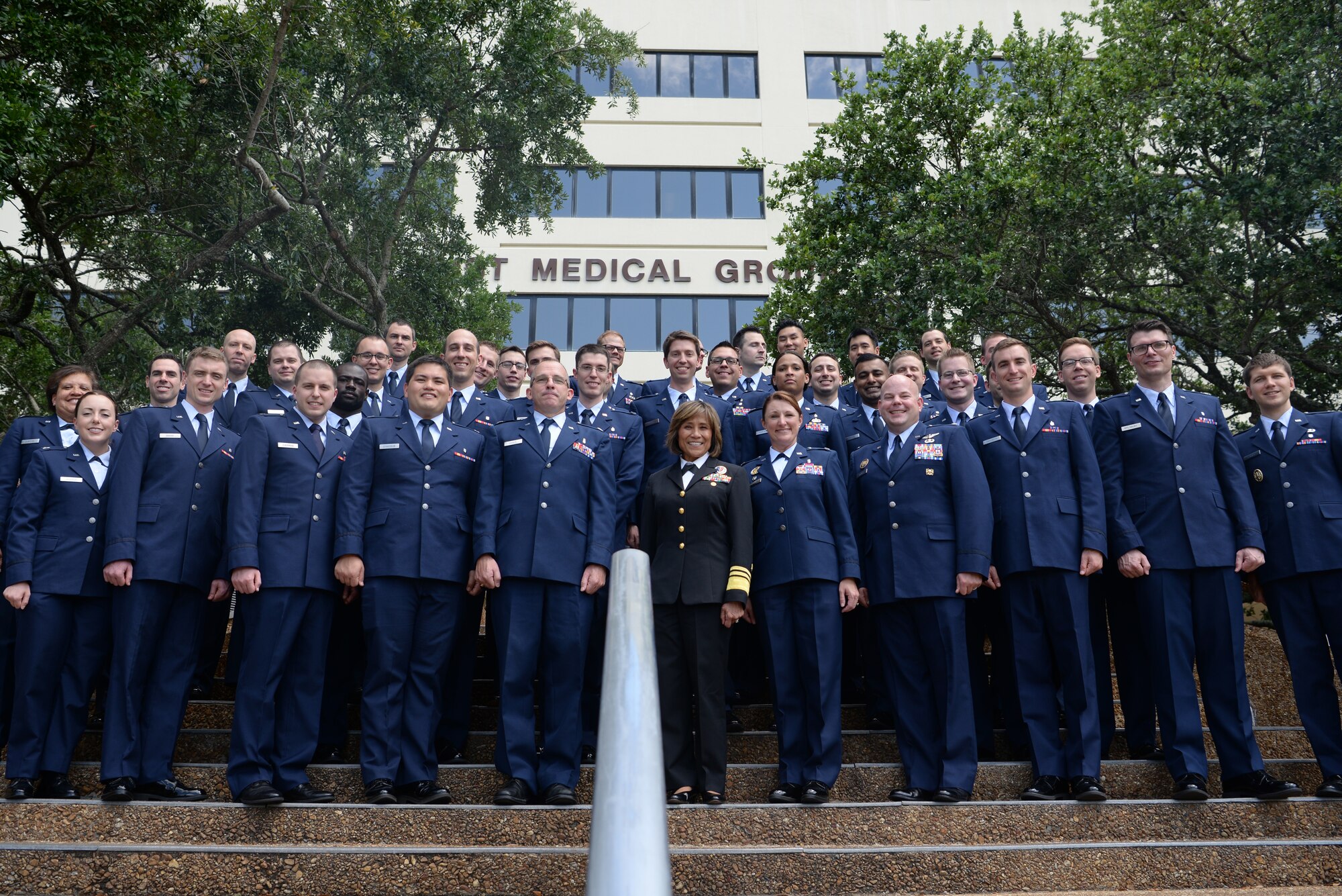 Graduate Medical Education program graduates pose for a group photo outside the 81st Medical Group at Keesler Air Force Base, Mississippi, May 23, 2019.