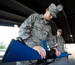 U.S. Air Force basic military training trainees practice assembling and disassembling their M-16 trainer weapon at Joint Base San Antonio-Lackland May 2. Airmen must know how to fix malfunctions in order to continue the fight and protect their fellow Wingman. Basic military training is an eight-week course designed to challenge Airmen mentally and physically.