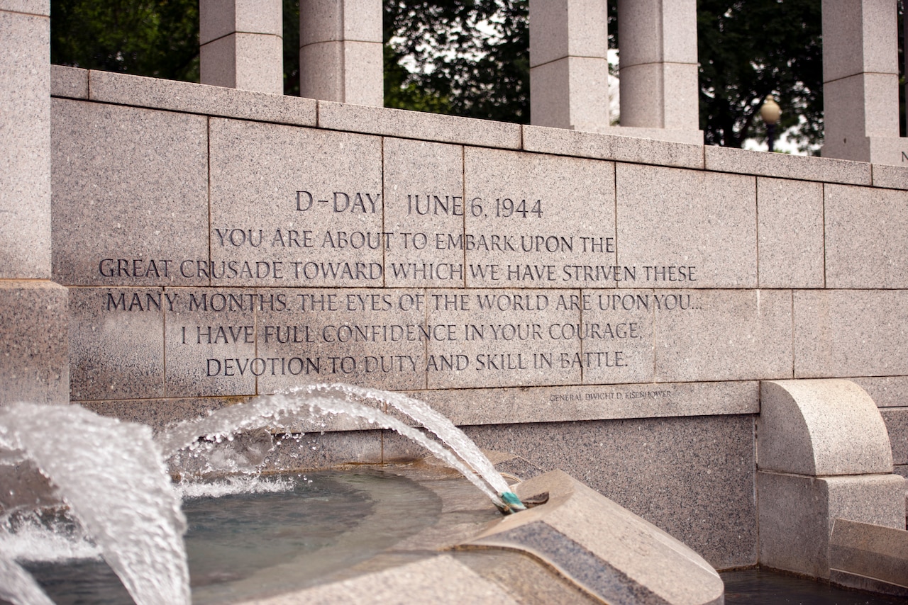 Words of encouragement from Gen. Dwight D. Eisenhower inscribed on a stone wall.