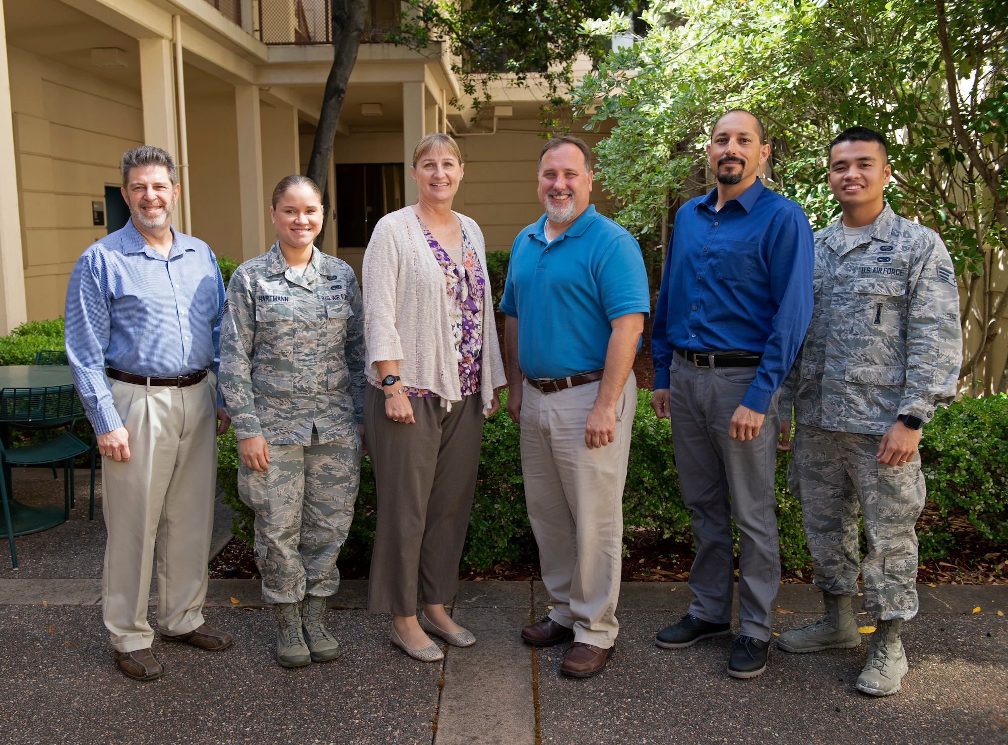 The 60th Air Mobility Wing Manpower Flight, poses for a photo May 16, 2019, at Travis Air Force Base, California. The Flight was recently awarded Manpower Flight of the year for 2018. The Flight filled 1,300 positions that valued at $114 million worth contracts to uphold Travis’ mission needs and requirements. (U.S. Air Force photo by Airman 1st Class Jonathon Carnell)