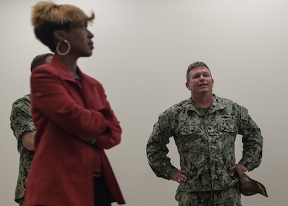 Kai Campbell, left, Saint Leo University regional representative and Commander Pat Sutton, Naval Support Activity executive officer, tour the building allocated to house Joint Base Charleston’s Navy College campus June 4, 2019.  The new campus will offer college classes in August 2019 for service members and their families to progress toward their educational goals.