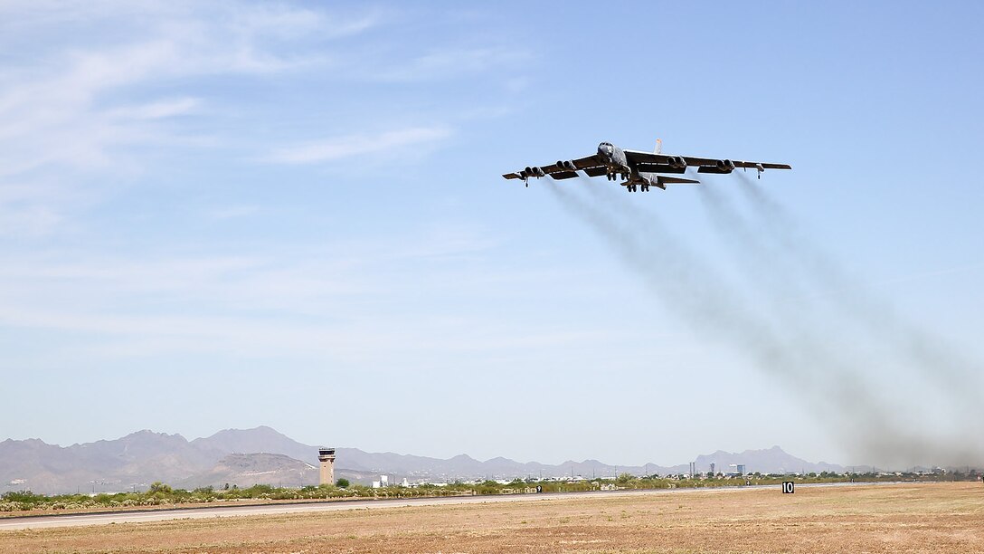 A B-52H Stratofortress, nicknamed "Wise Guy," departs Davis-Monthan Air Force Base, Ariz., May 14, 2019. The bomber was flown out of the 309th Aerospace Maintenance and Regeneration Group, also known as the "Boneyard", where it had been since 2008. (U.S. Air Force photo by Col. Jennifer Barnard)