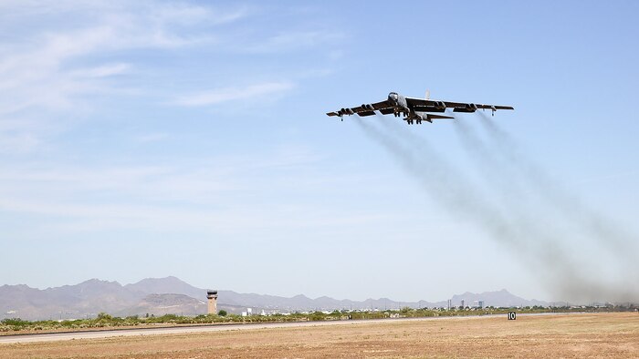 A B-52H Stratofortress, nicknamed "Wise Guy," departs Davis-Monthan Air Force Base, Ariz., May 14, 2019. The bomber was flown out of the 309th Aerospace Maintenance and Regeneration Group, also known as the "Boneyard", where it had been since 2008. (U.S. Air Force photo by Col. Jennifer Barnard)