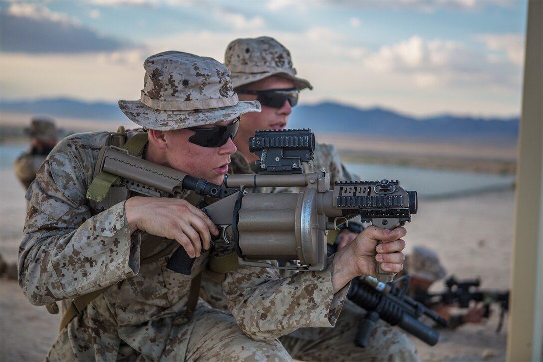 A Marine aims a weapon during an exercise.