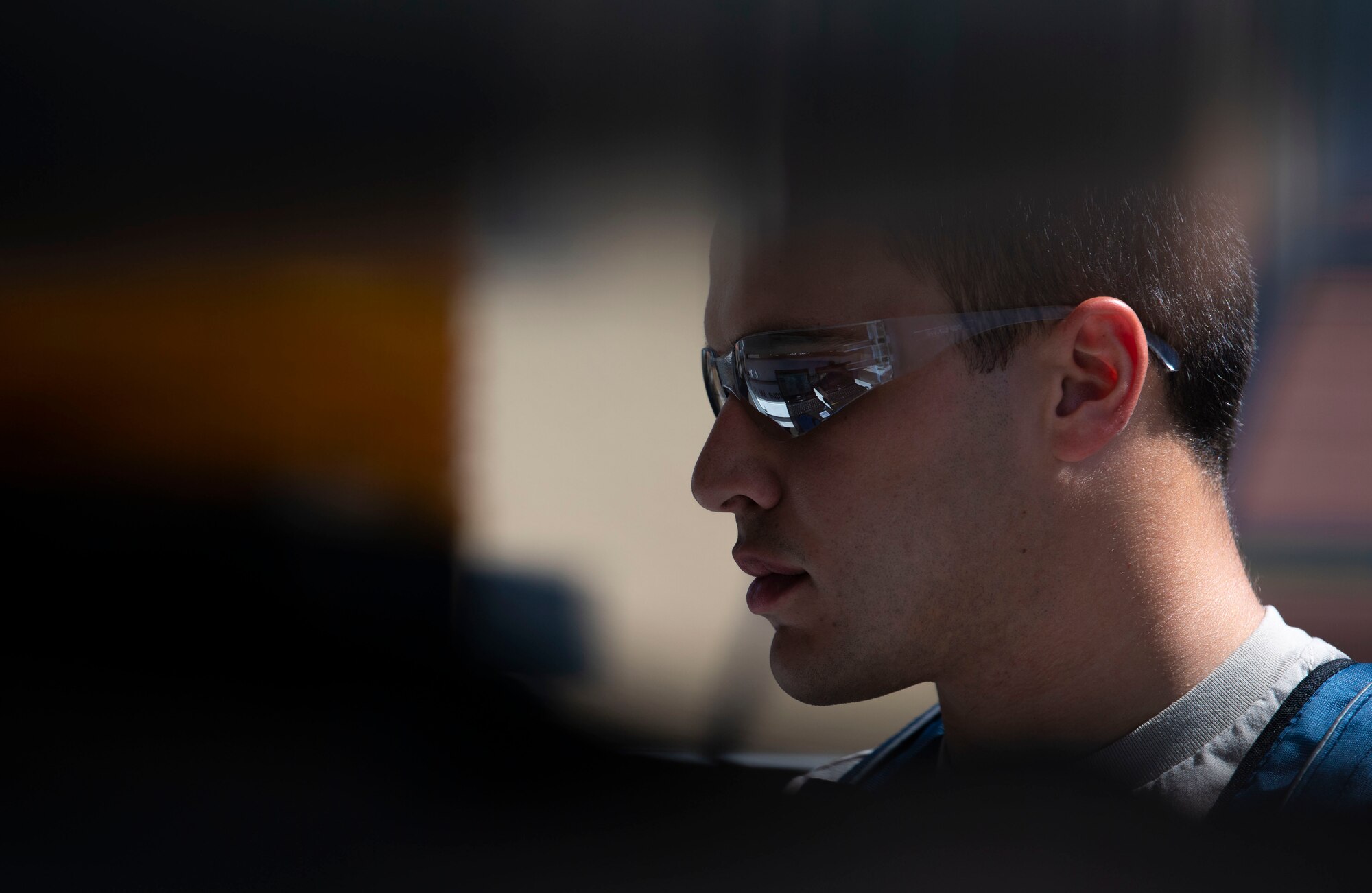 U.S. Air Force Airman David Yerushalmi, 60th Maintenance Squadron aerospace ground equipment technician, looks up operating procedures on a computer June 4, 2019, at Travis Air Force Base, California. The AGE flight ensures other maintenance teams have the equipment they need to launch aircraft on time. (U.S. Air Force photo by Airman 1st Class Jonathon Carnell)