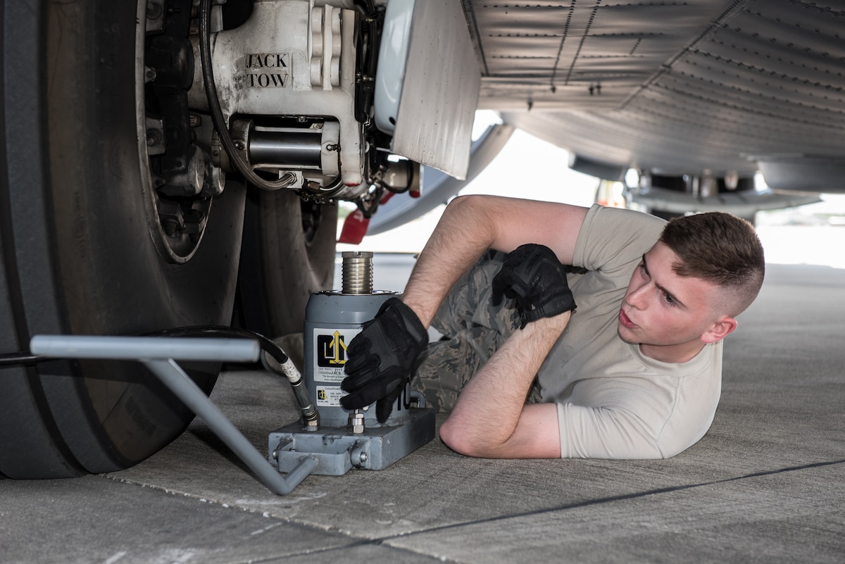 Airman 1st Class Matthew Dunlap, a crew chief in the Kentucky Air National Guard’s 123rd Airlift Wing, secures an aircraft jack in preparation for a class on how to change tires on C-130 Hercules aircraft at Maintenance University in Savannah, Ga., May 18, 2019. The four-day intensive training event was held at the Combat Readiness Training Center from May 19 to 22.