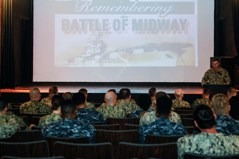 U.S. Navy Cmdr. Pat Sutton, Naval Support Activity executive officer, explains the Navy’s critical role in the nation’s defense during a Battle of Midway commemoration, June 6, 2019, at Joint Base Charleston’s Naval Weapons Station, S.C. The ceremony highlighted the contributions of U.S. Sailors to the success at Midway during World War II. The Battle of Midway took place between June 4, 1942, and June 7, 1942, six months after Japan's attack on Pearl Harbor. (U.S. Air Force photo by Senior Airman Thomas T. Charlton)