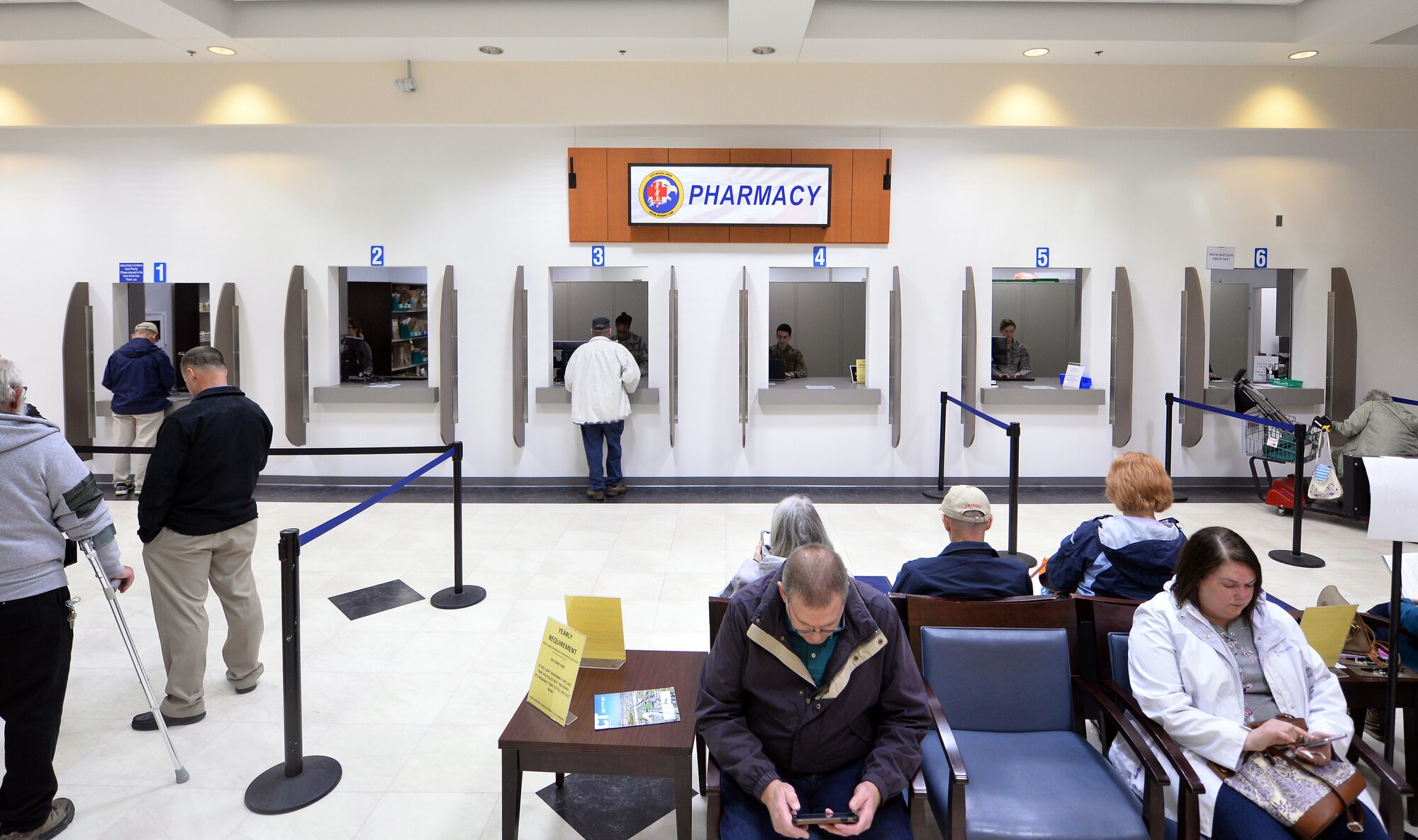 Patients wait to pick-up prescriptions May 8, 2019, at the new satellite pharmacy located in the north side of the Offutt Air Force Base, Nebraska Base Exchange. The satellite pharmacy remains handicap accessible and patients have more seating space available, with the added option to shop at the BX while they wait.