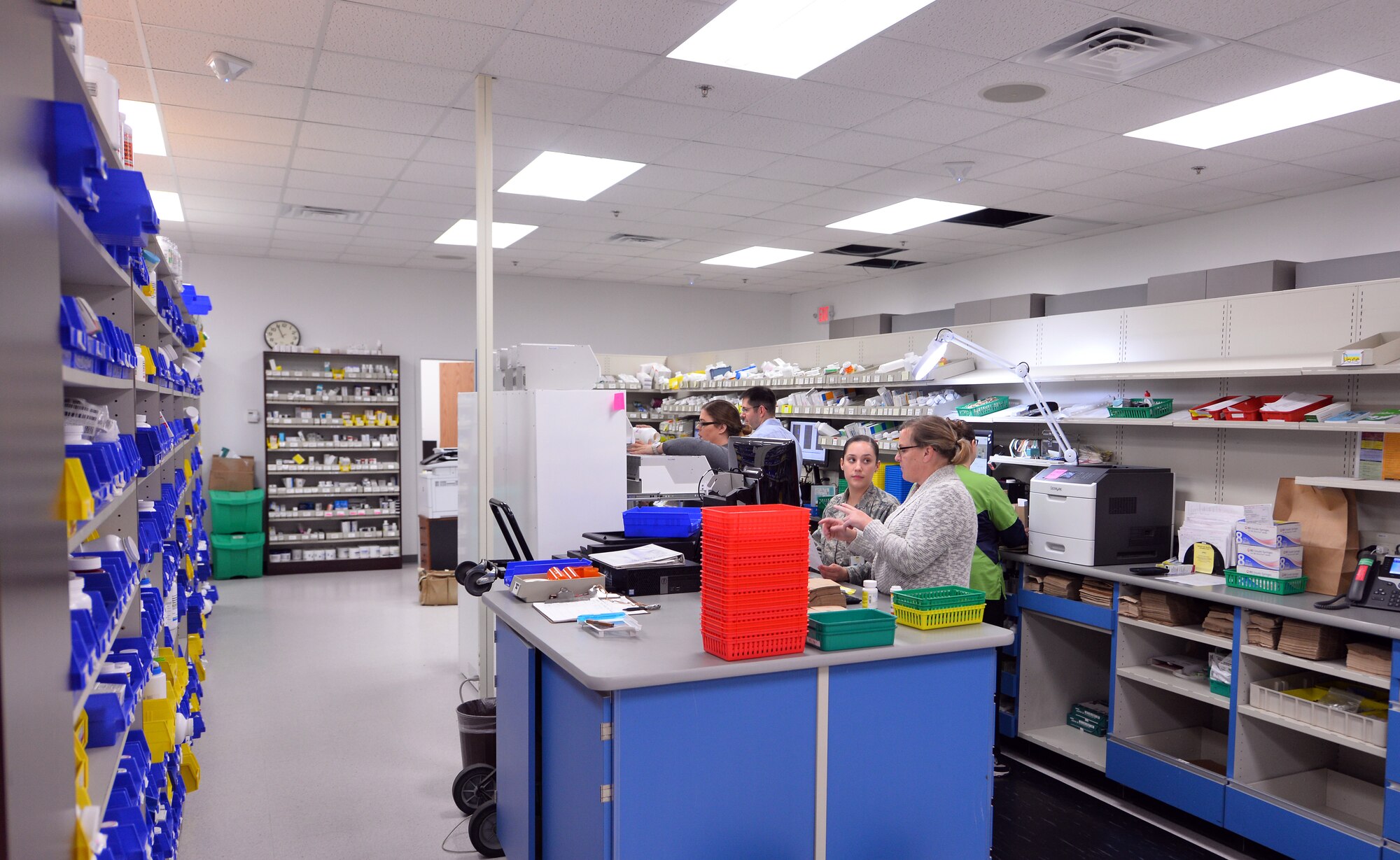 Pharmacy technicians sort and fill prescriptions May 8, 2019, at the new satellite pharmacy located in the north side of the Offutt Air Force Base, Nebraska Base Exchange. The pharmacy gained approximately 30 percent in square footage, providing additional space to fill and manage prescriptions. It now has six windows available, two windows for prescription drop-off, three windows for prescription pick-up and one window for consultation or questions.