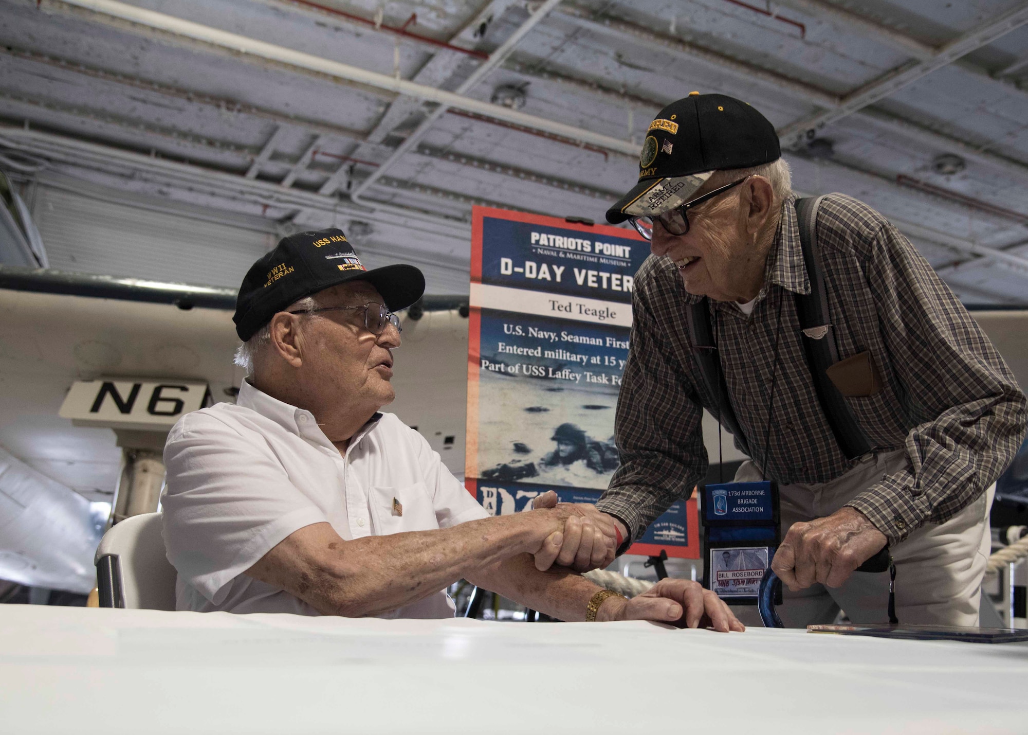 U.S. Navy D-Day Veteran, Seaman First Class Ted Teagle part of the USS Laffey Task Force thanks fellow brother arms, June 6, 2019, at USS Yorktown, South Carolina. Hundreds of patrons came out to the Patriot Point 75th Anniversary of D-Day celebration to honor of the nine WWII Veterans, such as Teagle who joined the U.S. Navy at 15-years-old.