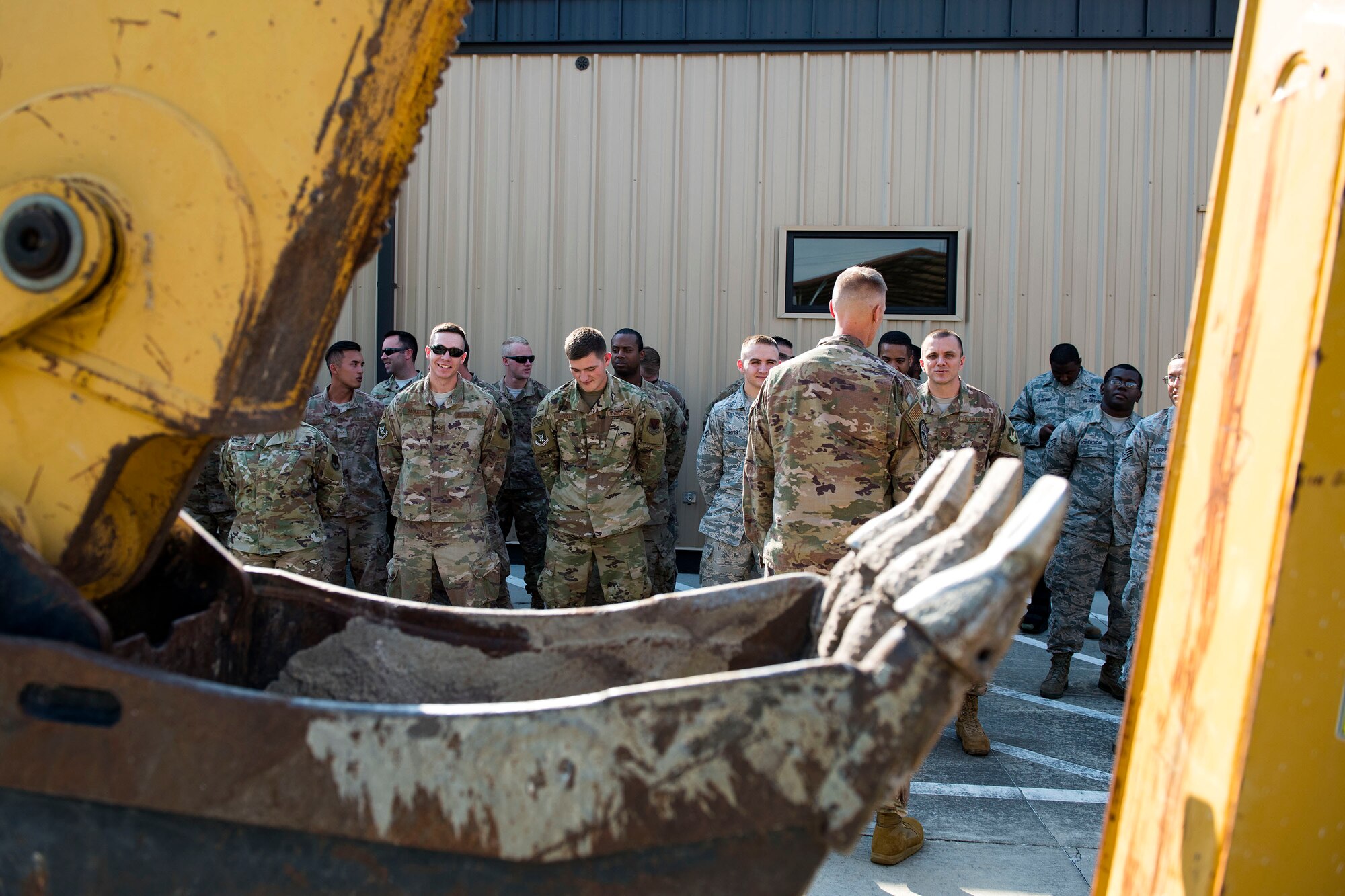 Col. Dee Jay Katzer, command engineer for Air Combat Command, speaks to Airmen from the 23d Civil Engineer Squadron (CES) during a squadron tour, May 22, 2019, at Moody Air Force Base, Ga. Katzer’s first visit to Moody consisted of a base tour, along with visiting various 23d CES shops. He also observed Airmen from the 23d CES conduct airfield recovery training. “(The visit) gives Katzer the opportunity to directly interact with the Airmen of the squadron,” said Lt. Col. Michael Francis, 23d CES commander. “This allows Katzer and his staff to better advocate for the engineering and facility requirements needed to enable the operational missions here.” (U.S. Air Force photo by Senior Airman Erick Requadt)