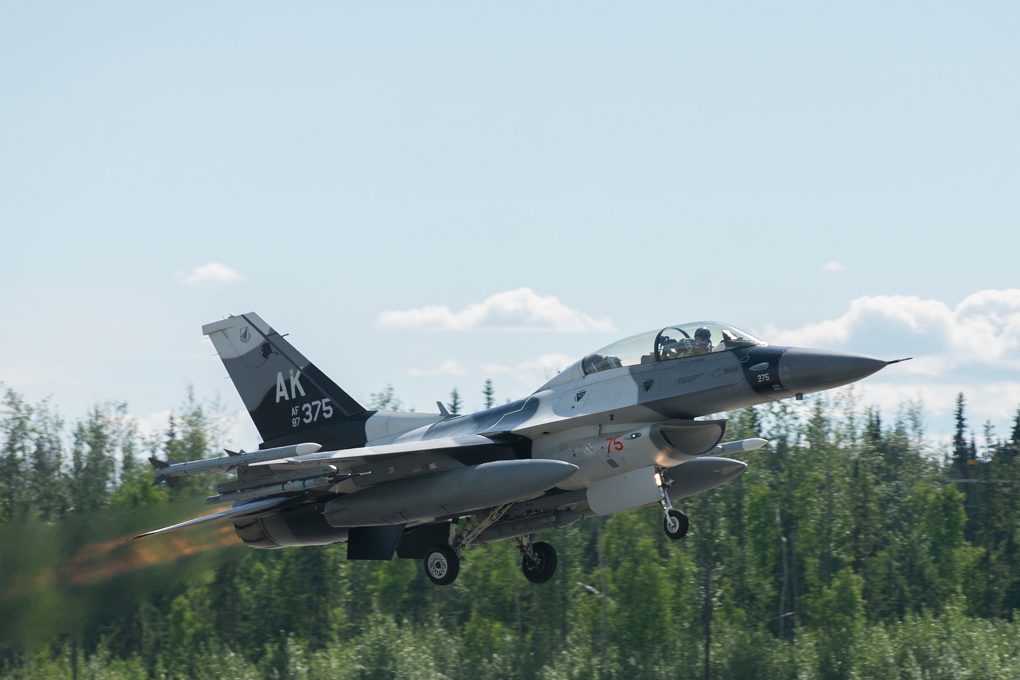 A U.S. Air Force F-16 Fighting Falcon assigned to the 19th Aggressor Squadron takes off in preparation for RED FLAG-Alaska (RF-A) 19-2 on Eielson Air Force Base, Alaska, June 4, 2019.