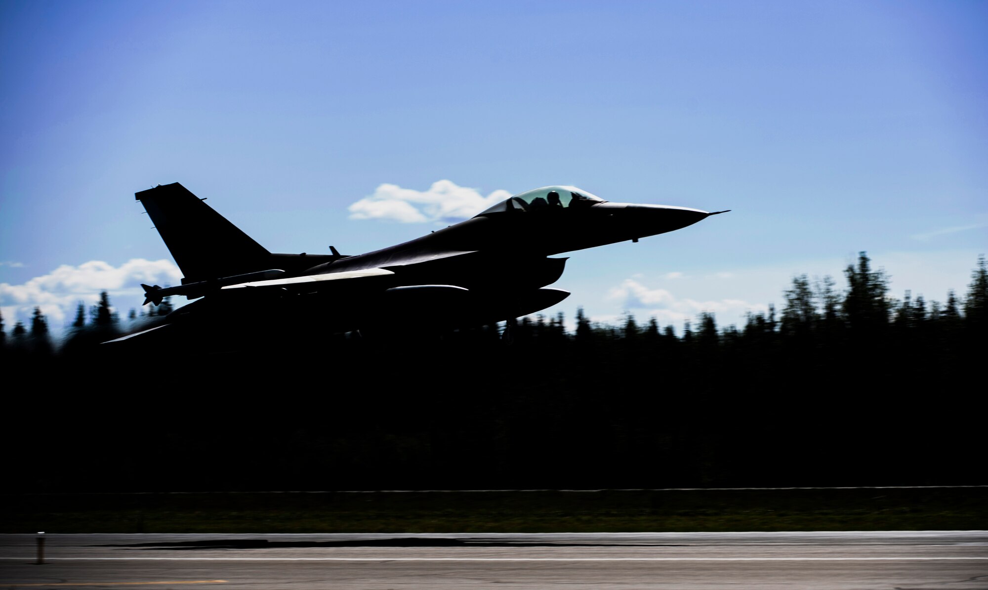 An F-16 Fighting Falcon from the 80th Fighter Squadron, Kunsan Air Base, Republic of Korea, takes off from Eielson Air Force Base, Alaska, June 5, 2019. The 80th FS was participating in Exercise Distant Frontier, a supplemental training event for units who arrived early for Exercise Red Flag-Alaska or stayed after Exercise Northern Edge. (U.S. Air Force photo  by Senior Airman Stefan Alvarez)