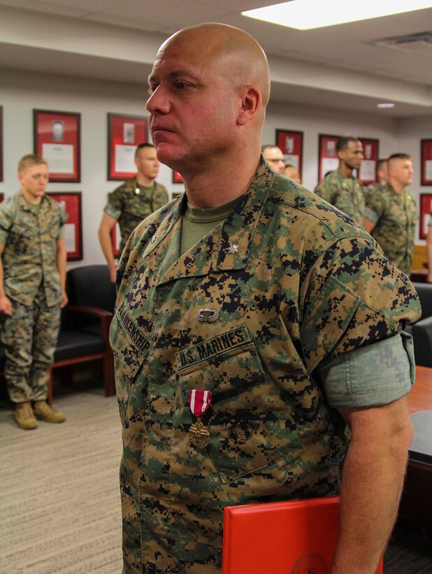 CAMP HUMPHREYS, Republic of Korea – Lt. Col. David M. Blankenship, U.S. Marine Corps Forces Korea G1 assistant chief of staff, receives the Meritorious Service Medal during an awards ceremony here, June 7. Blankenship received the award for his unwavering devotion to duty as the administration AC/S as well as for the commitment he demonstrated in assisting every Marine in MARFORK across a multitude of areas. (Official U.S. Marine Corps photos by Sgt. Nathaniel Hanscom/Released)