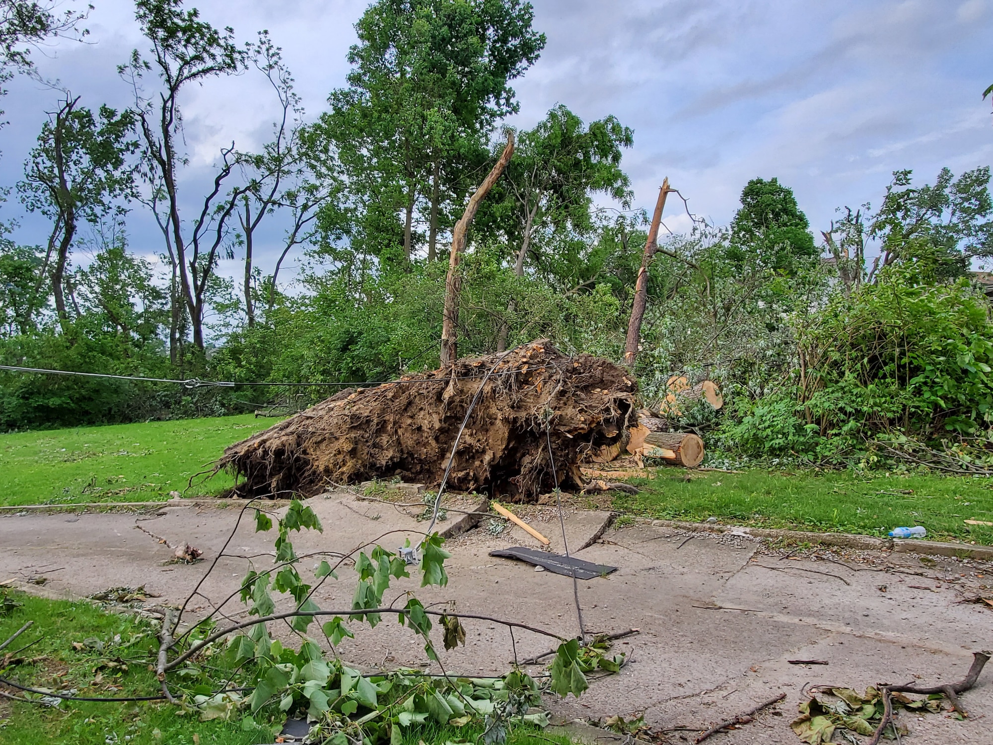 Air Force Research Laboratory employees helped others in need of assistance after multiple tornadoes struck areas surrounding Wright-Patterson Air Force Base during the evening of Memorial Day 2019. Trees were uprooted, roofs were torn off, and in some cases, entire structures were destroyed by the storms. (U.S. Air Force Photo/ Capt. Evan McDowell)