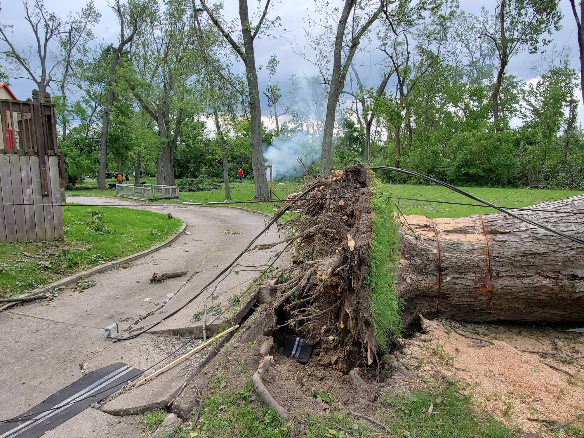 Air Force Research Laboratory employees helped others in need of assistance after multiple tornadoes struck areas surrounding Wright-Patterson Air Force Base during the evening of Memorial Day 2019. Trees were uprooted, roofs were torn off, and in some cases, entire structures were destroyed by the storms. (U.S. Air Force Photo/ Capt. Evan McDowell)
