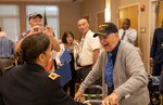 New York Army National Guard Col. Isabel Smith, Chief of Staff of the 53rd Troop Command, greets a World War II veteran at the New York State Veterans Home on Montrose, N.Y. on June 6,  2019 during an event organized by New York Gov. Andrew M. Cuomo to recognize veterans. Smith was one of five National Guard senior leaders who visited the five state veterans home to present New York State Medals to service members who served on D-Day or in the European Campaign.