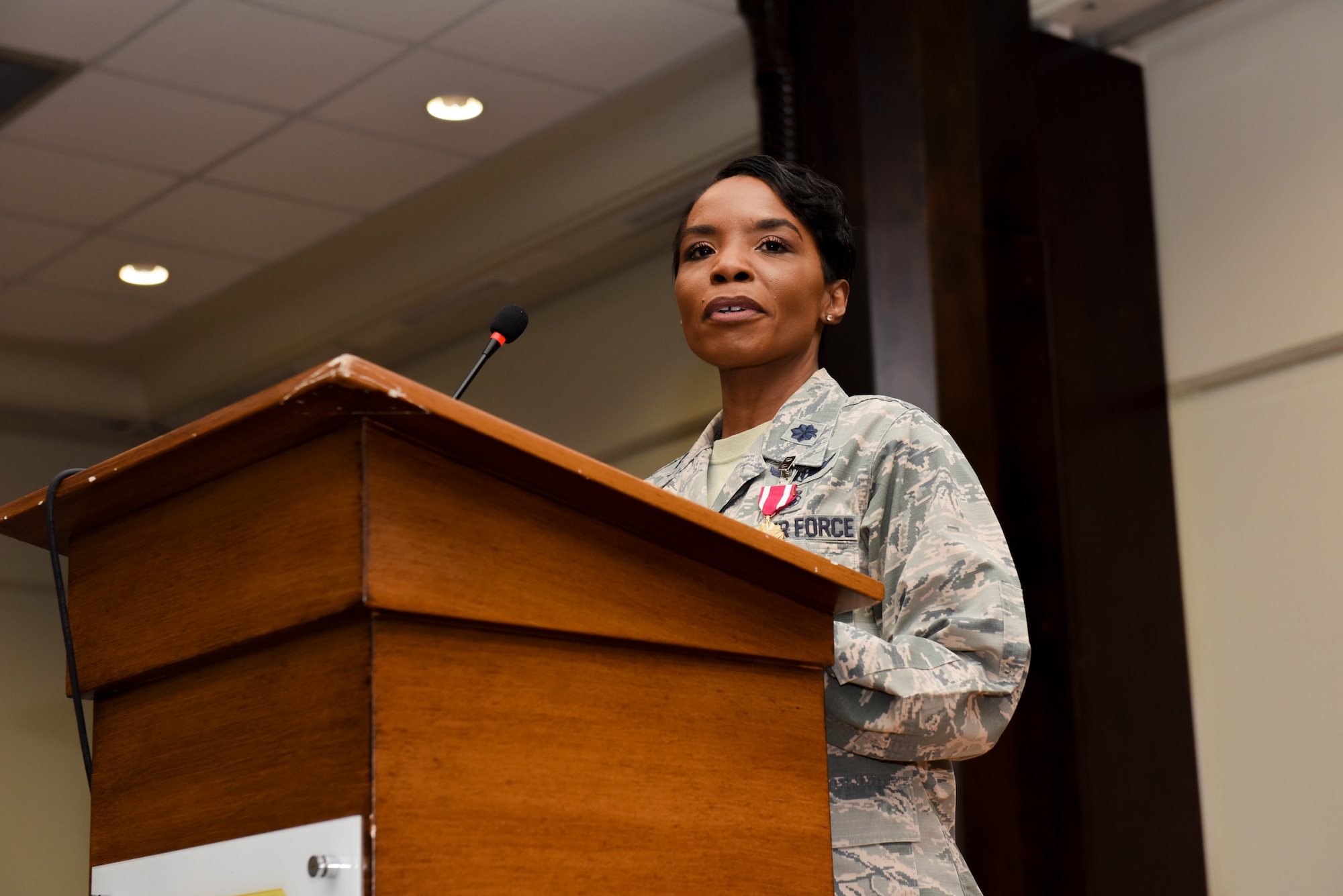 Lt. Col. Sarah Evans, 39th Medical Operations Squadron outgoing commander, provides remarks to the attendees of her change of command ceremony June 7, 2019, at Incirlik Air Base, Turkey. During her remarks, Evans thanked her Airmen for their hard work and dedication in performing preventive care, dental work, surgeries, and mental health services to the Airman of Incirlik. (U.S. Air Force photo by Staff Sgt. Matthew J. Wisher)