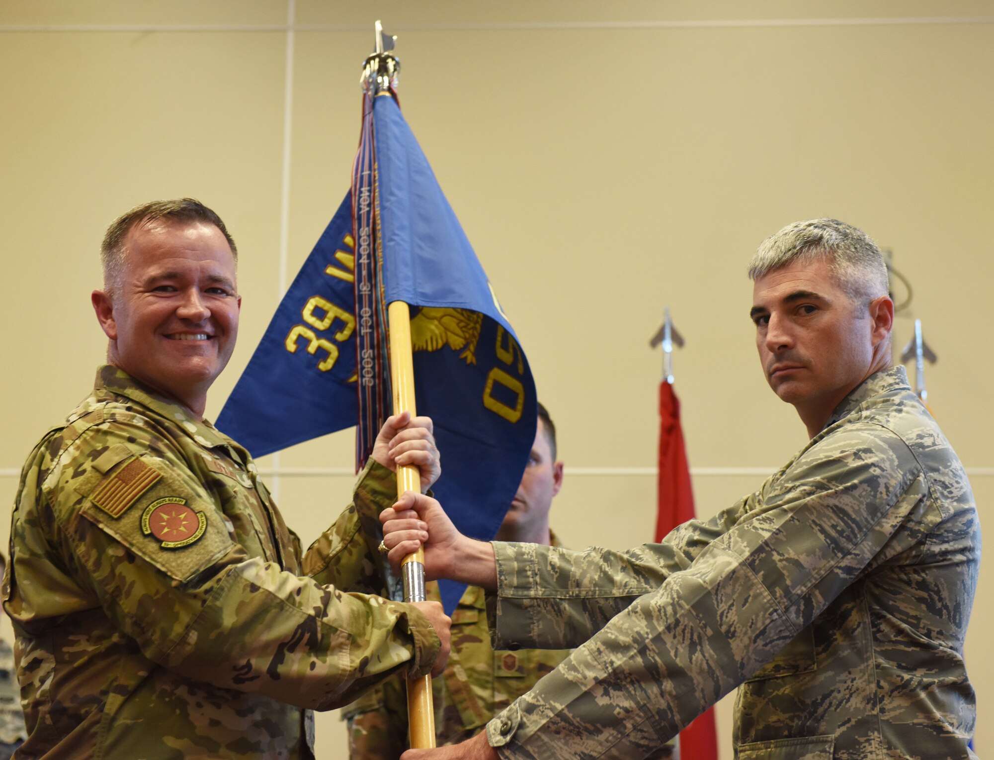 Col. Paul R. Quigley, 39th Weapons System Security Group commander, left, presents the Meritorious Service Medal to Lt. Col. John A. Talafuse, outgoing 39th Operations Support Squadron commander, during a change of command ceremony June 6, 2019, on Incirlik Air Base, Turkey. During his time as commander, Talafuse oversaw 80,000 operations at the U.S. Air Force’s busiest air traffic control complex in Europe. (U.S. Air Force photo by Senior Airman Joshua Magbanua)