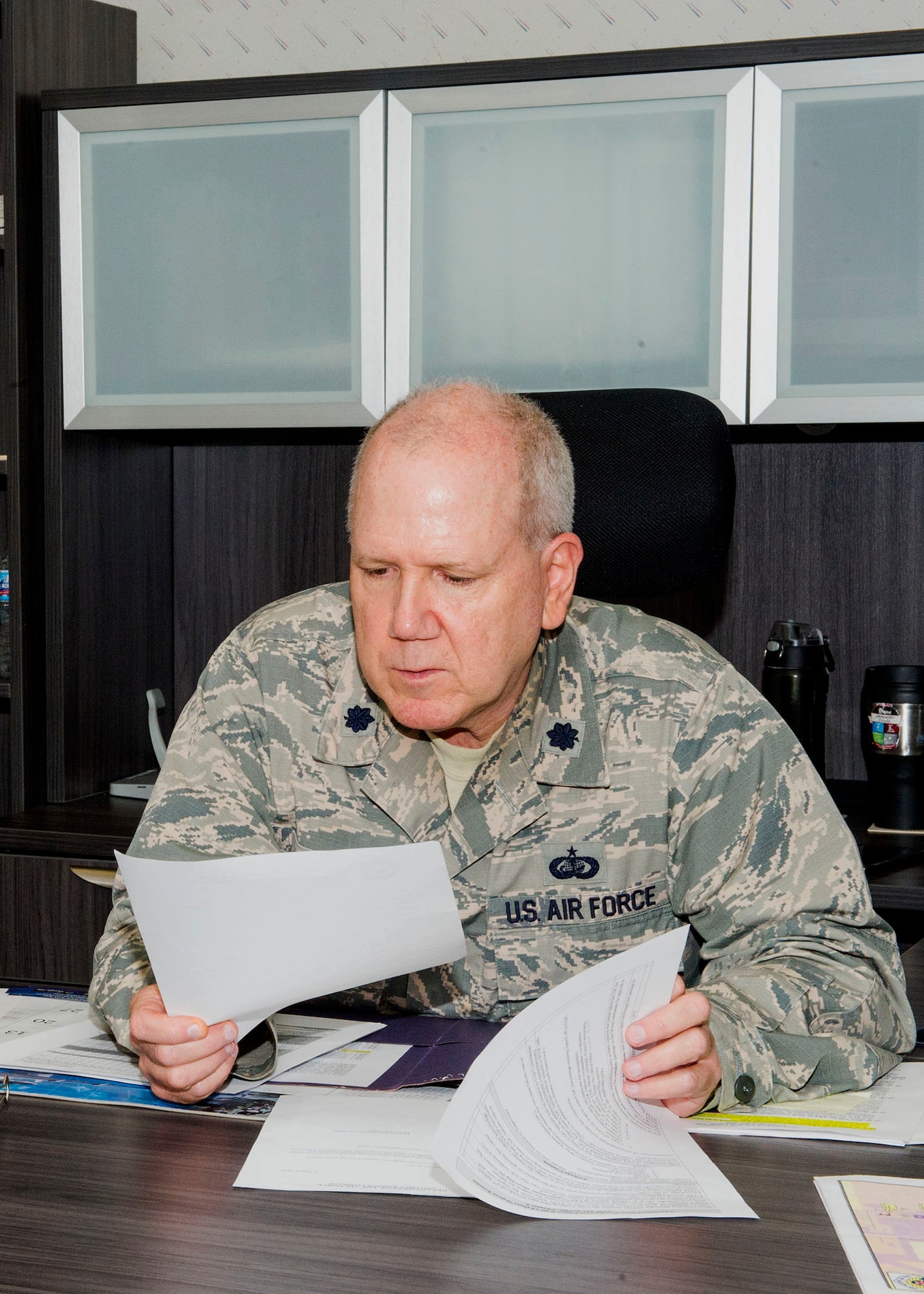 Lt. Col. Eric Kase reviews paperwork in his new office at Grissom Air Reserve Base, Ind., June 5, 2019. Kase recently became the operations officer for the 434th Force Support Squadron
