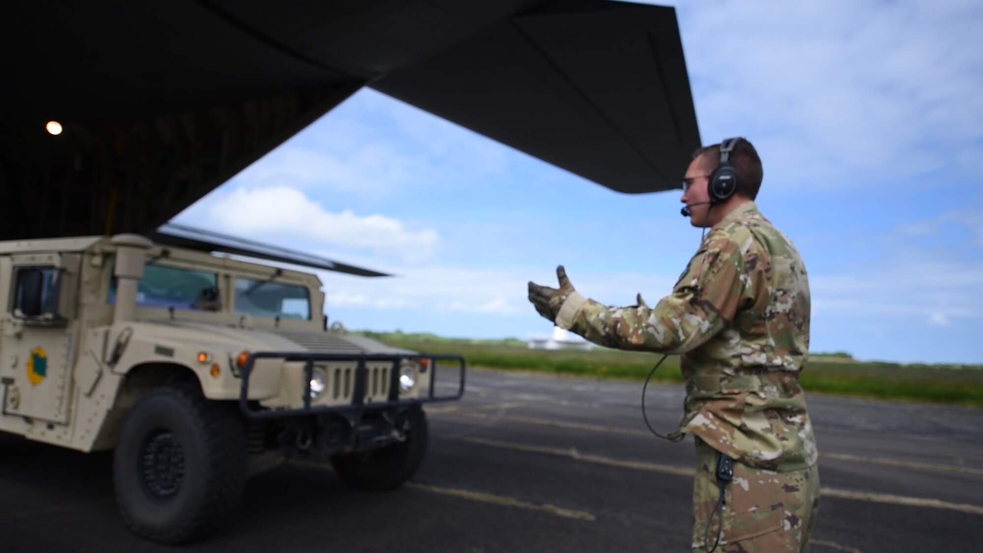 humvee unloads off C-130